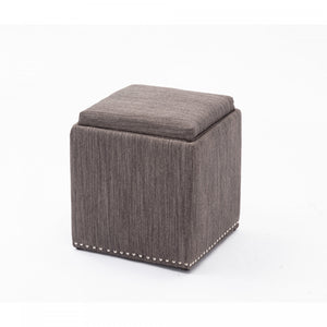 Pouf Chase gris anthracite en tissu avec couvercle qui se retourne en plateau